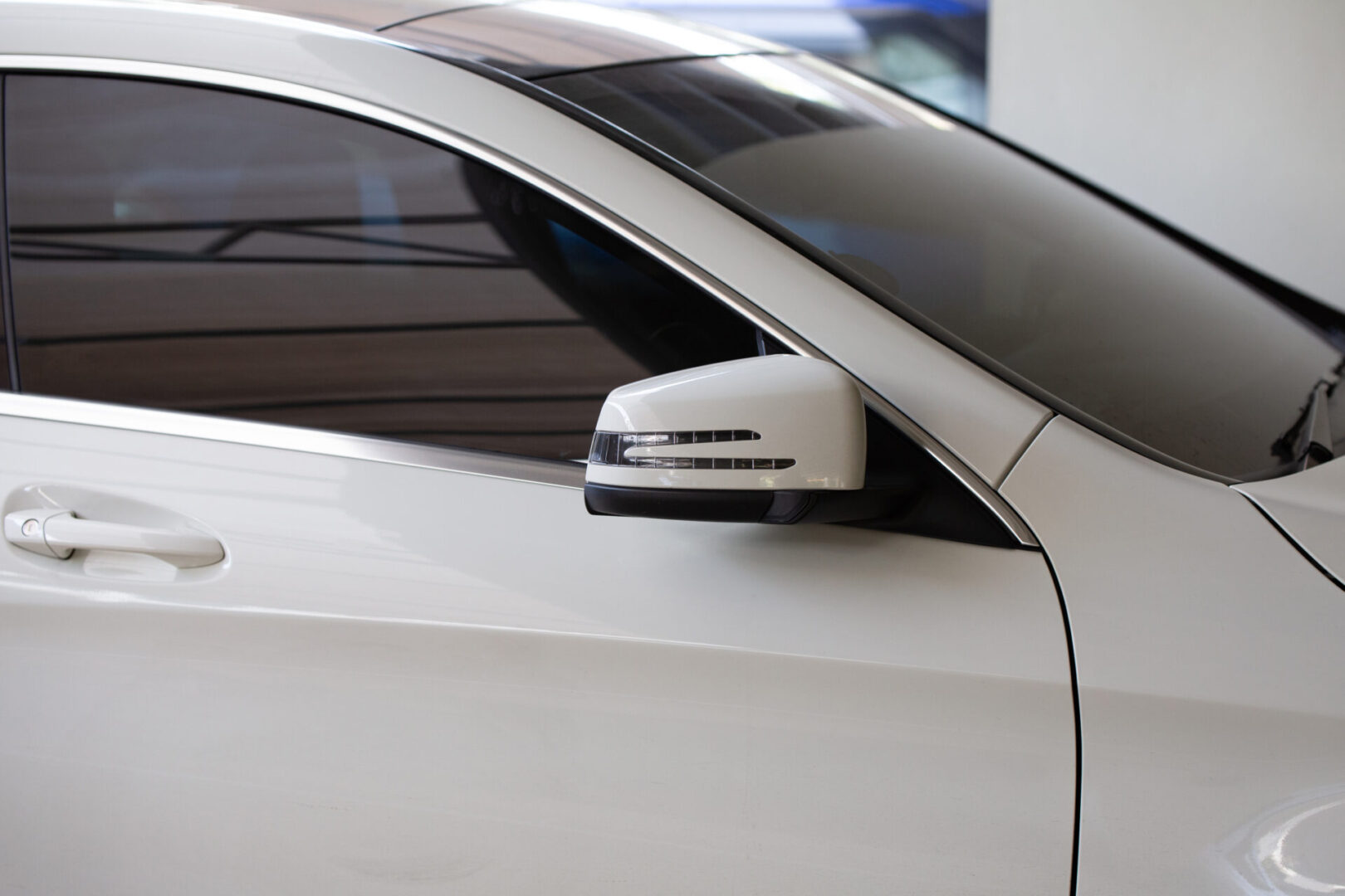 A close up of the side mirror on a car
